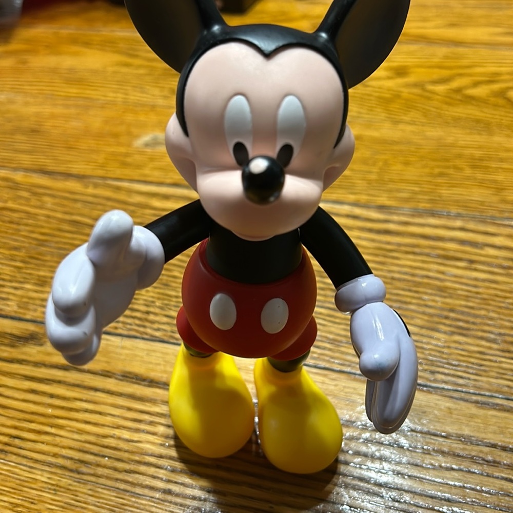 Disney Mickey Mouse plastic posable figurine. Head, legs and arms rotate.